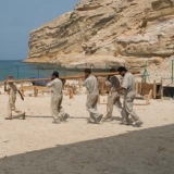 178   Carrying a plank down to the sea