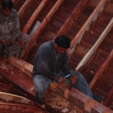 097   Shaping the sister keelson: additional timbers placed alongside the keelson