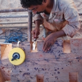 109   Chiselling the notches for the frames into the keelson (2)