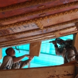 156   Drilling the sewing holes on the through beams