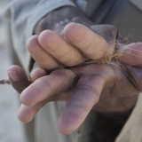 025   Twisting the coir ropes