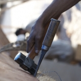 031   Hammering flat the stitches