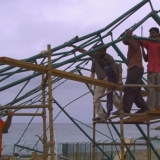 044   Work to clear the wrecked canopy begins