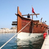 104   Fenders are placed as the Jewel is moored