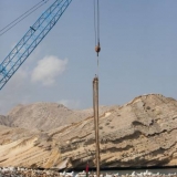 125   Centimetre by centimetre the mast is edged into position