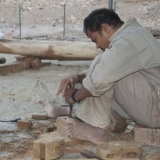 079   Raju Valap works on shaping rigging blocks