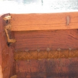 013   Every plank has been stitched together, then the holes plugged