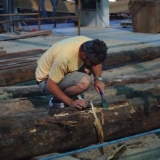 037   Luca Belfioretti checks the mast timber