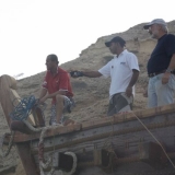 090   Capt Saleh Al Jabri directs from the deck of the Jewel of Muscat