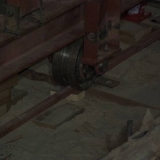 060   The rear wheels connect with the rails first