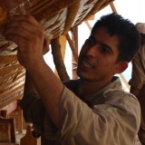 022   Sajid Madathile, Ropeworker, checking the sewing holes