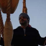 061   H.E Sayyid Badr tries his hand at steering