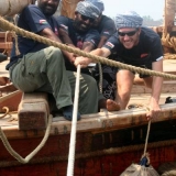 164   Hauling on the lines to bring her in