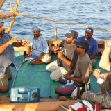 111   Adam Al Baluchi leads his team in charades