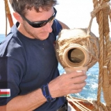 046   Alessandro Ghidoni using a traditional clay water jug