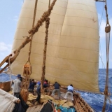 126   Lowering the mizzen sail in high wind is a tough job