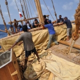 128   Preparing to hoist the storm sail