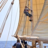 132   Mateo Willis climbs the main mast to inspect for wear