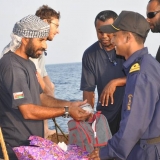 144   Captain Saleh exchanges gifts with an Indian naval officer