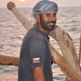 156   Captain Saleh at the helm on the last evening before Cochin