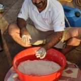 087   Adam Al Baluchi makes the morning bread