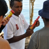 080   First Mate Khamis Al Hamdani shows the crew how to use emergency flares