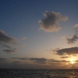 071   Sunrise over calmer seas