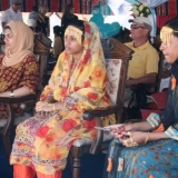 011   Young Omani women in traditional dress