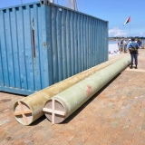 065   The new palm leaf matting sails arrive in 40-foot tubes