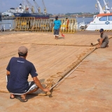 075   Said Al Tarshi and Ayaz Al Zadjali measure the new sails made from palm leaf matting