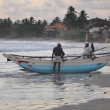 094   Davata fishermen bring in their boat