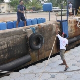 080   Adam Al Balushi and Ahmed Al Adawi unload empty water cans