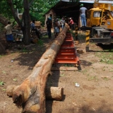 100   Shaping one mast begins.
