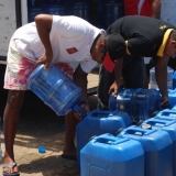124   Every jerry can must be filled by hand.
