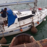 112   Ahmed Al Adawy makes sure a drifting sailboat doesn't collide with the Jewel