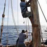 028   Said Al Tarshi climbing the mizzen mast