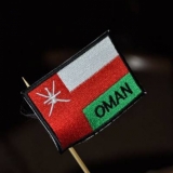 092   The Omani flag flies high on the birthday cake