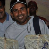 091   Captain Saleh with his surprise Jewel of Muscat birthday cake