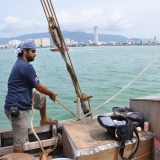 025   Ayaz Al Zadjali tightens a rope as the ship glides past Penang