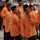 003   Malaysian drummer boys watch from the port