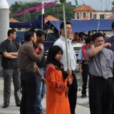 004   Girl in traditional dress with our Malaysian logisticians team