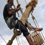 022   Hussein Al Raisi fixes leather to the forestay