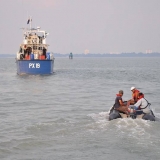028   Captain Saleh and crew members pay a visit to Malaysian escort vessel PX 19