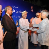 159   Helen Kirkbride, project administrator, receives a certificate of appreciation for her work for Jewel of Muscat.