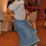 114   One of the Omani dancers in mid-step