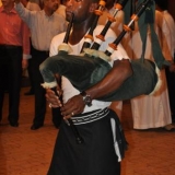 116   The troupe's bagpiper
