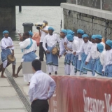 065   Omani dancers welcome the crew at the quayside