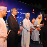 154   The representative of Oman Shipping Company receives a certificate of appreciation for their support of the project