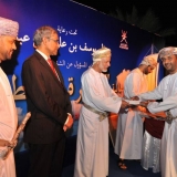 158   The representative of Galfar receives a certificate of appreciation for their support of the project