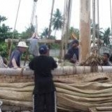 084   Working on the Jewel's palm leaf mat sails